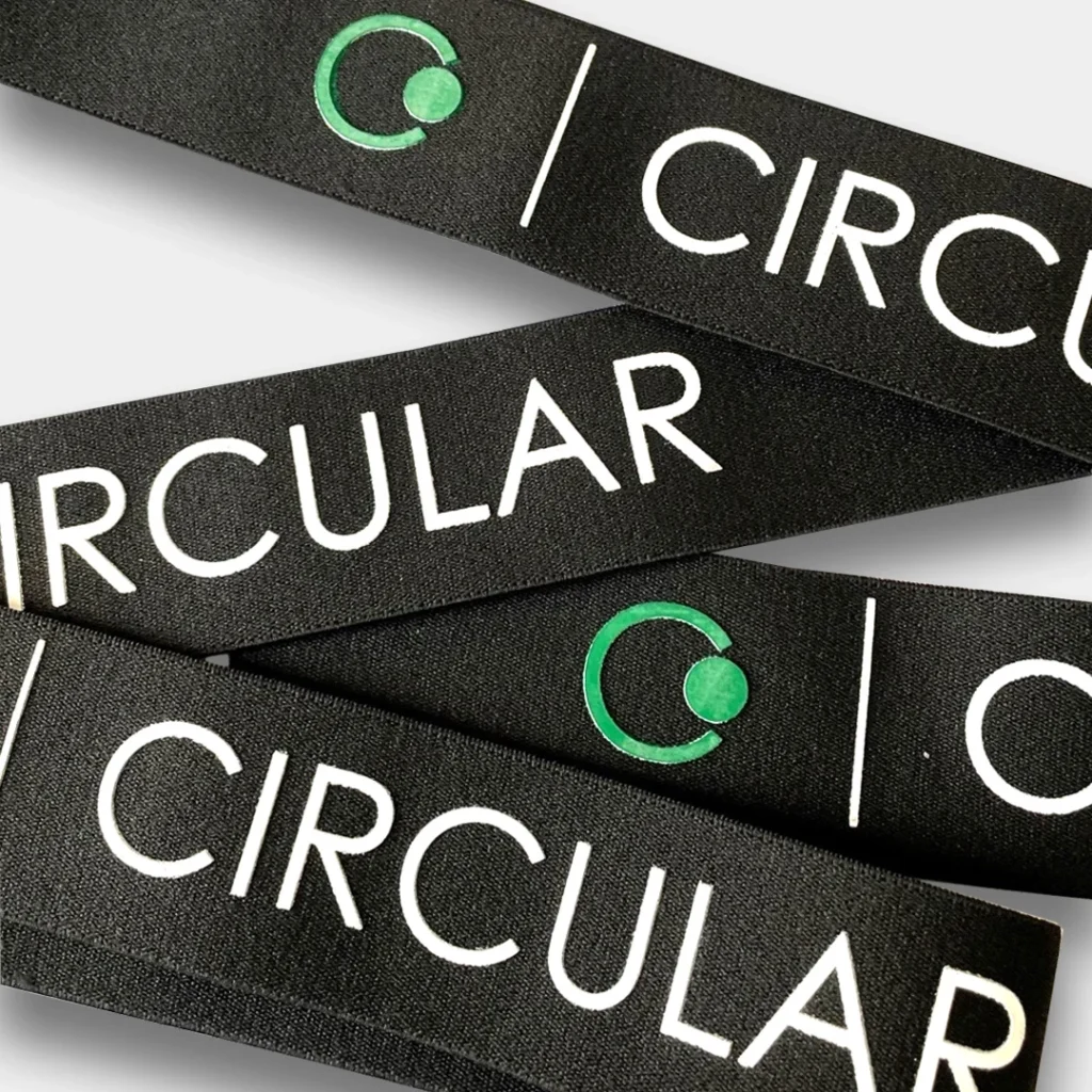 Black tape with white and green Circular logo