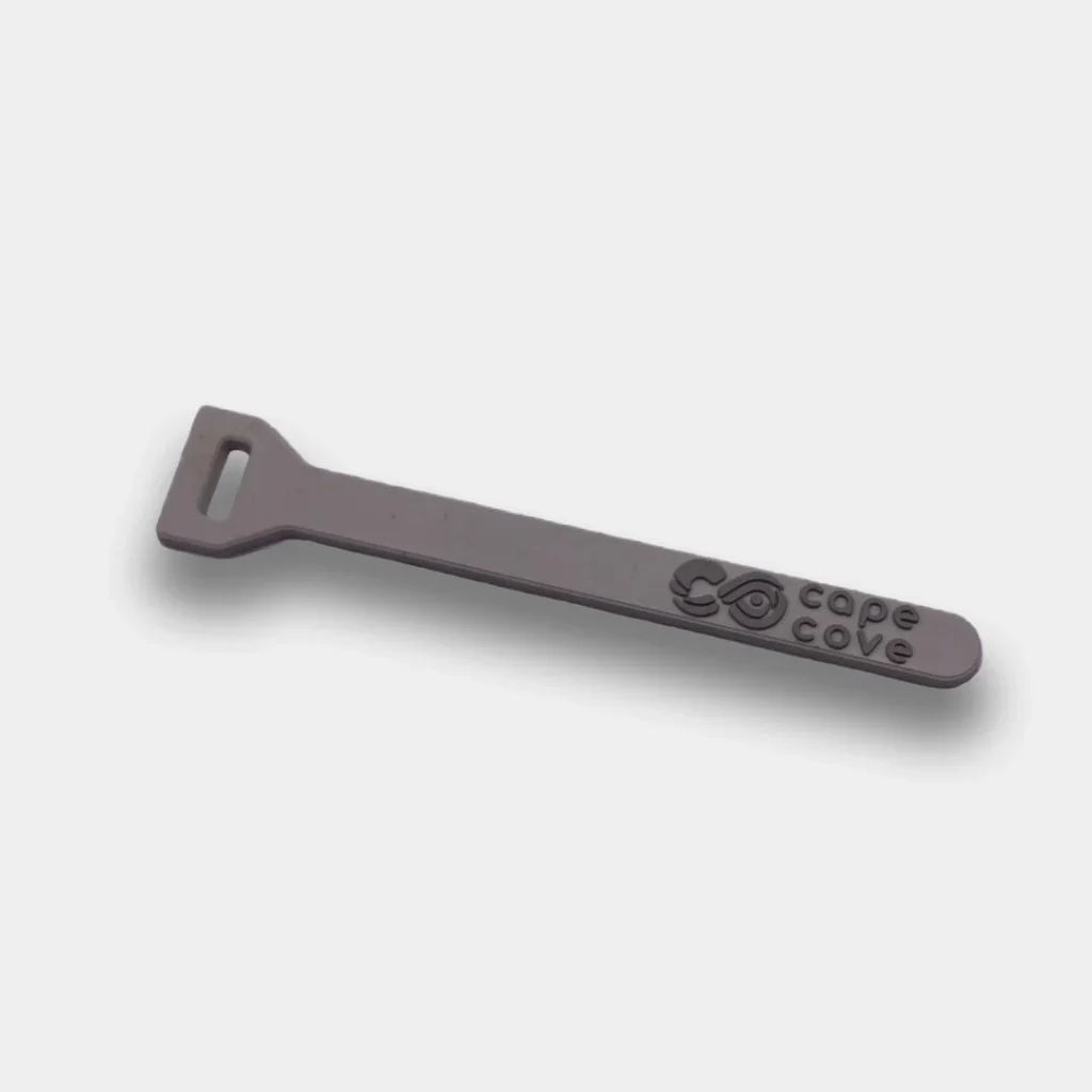 Grey zip puller with Cape Cove logo