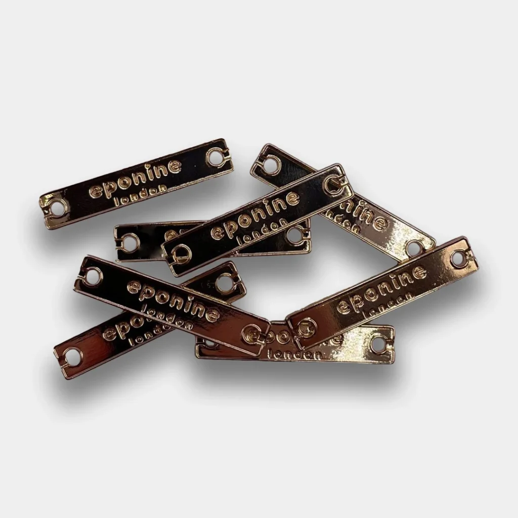 Rectangular metal trim with Eponine logo