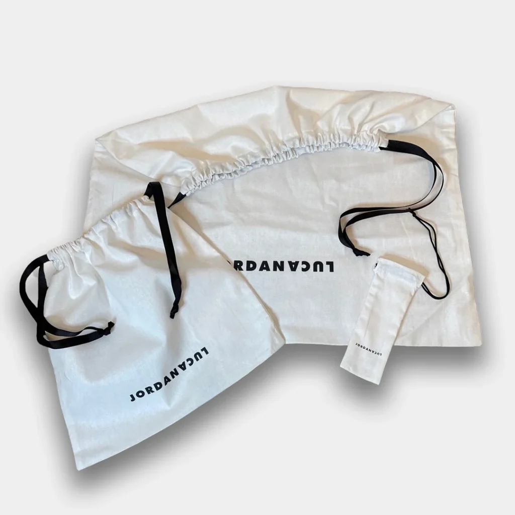 White dust bag with Jordan Luca logo