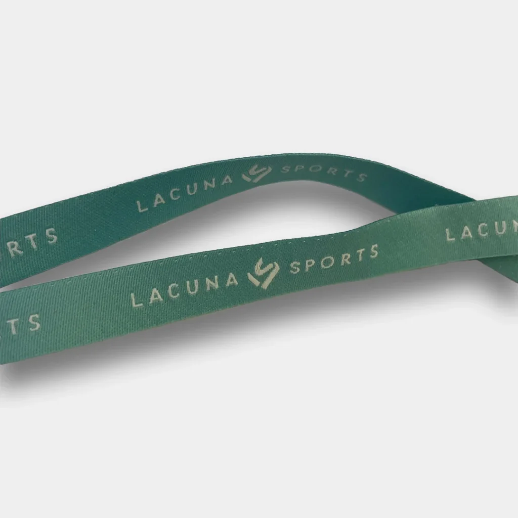 Green tape with Lucuna Sports logo in gold