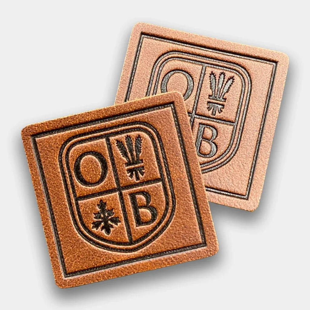 Brown leather patches with Oxford Blue logo