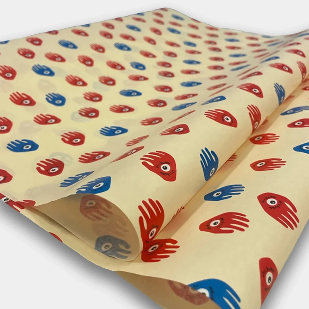 Yellow packing paper with red and blue hands